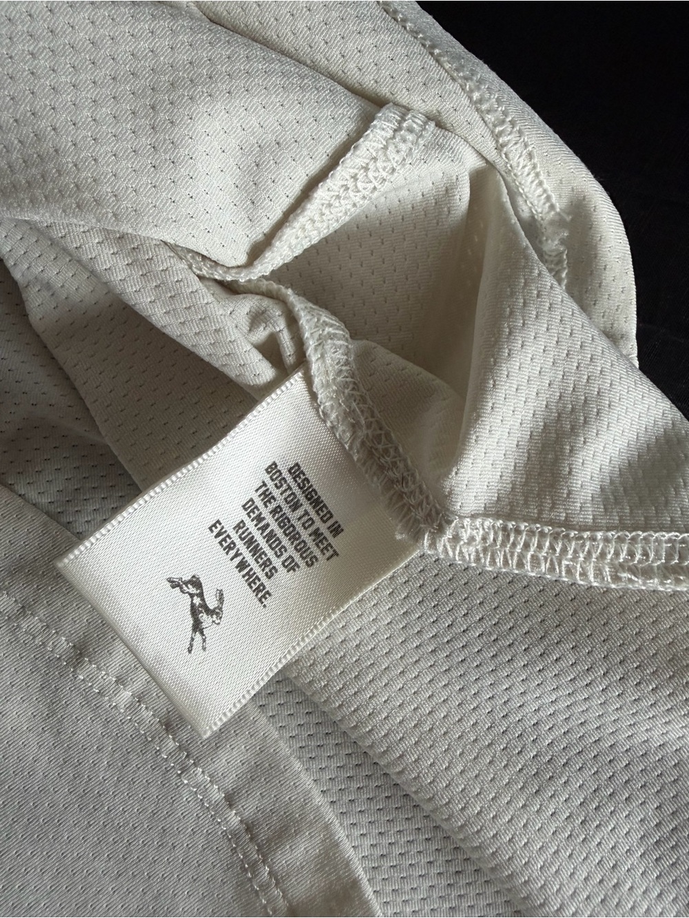 Tracksmith Cream Performance Tank with Rabbit Logo - Picture 9 of 11